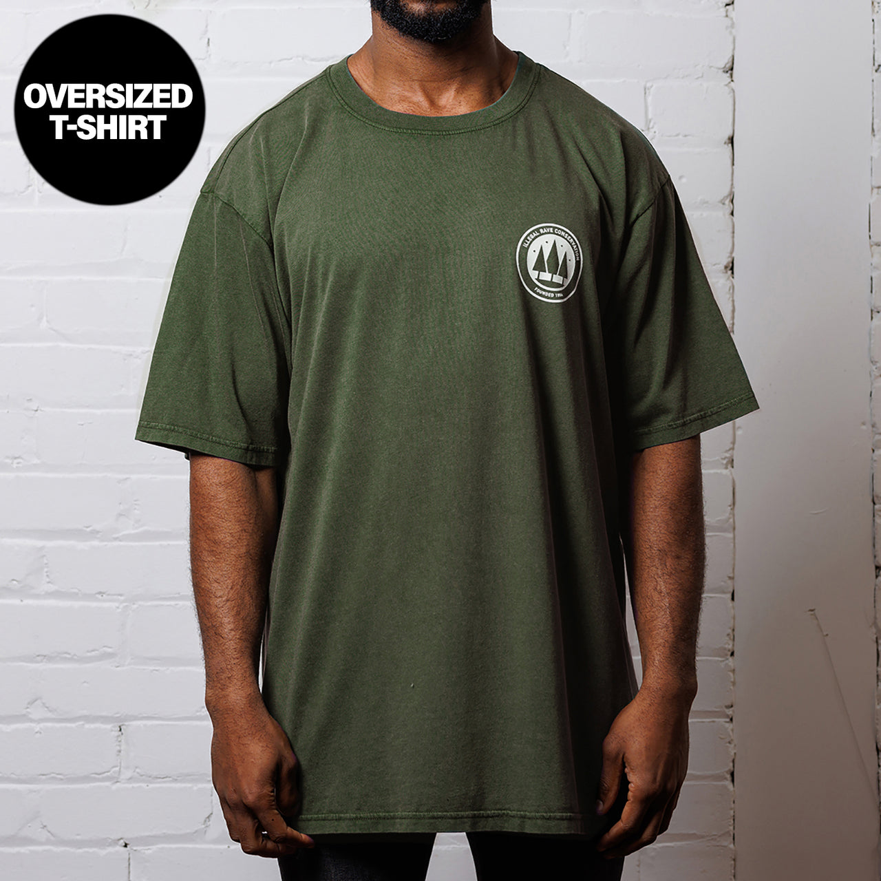 Illegal Rave Conservation Crest  - Oversized Tshirt - Stone Wash Green