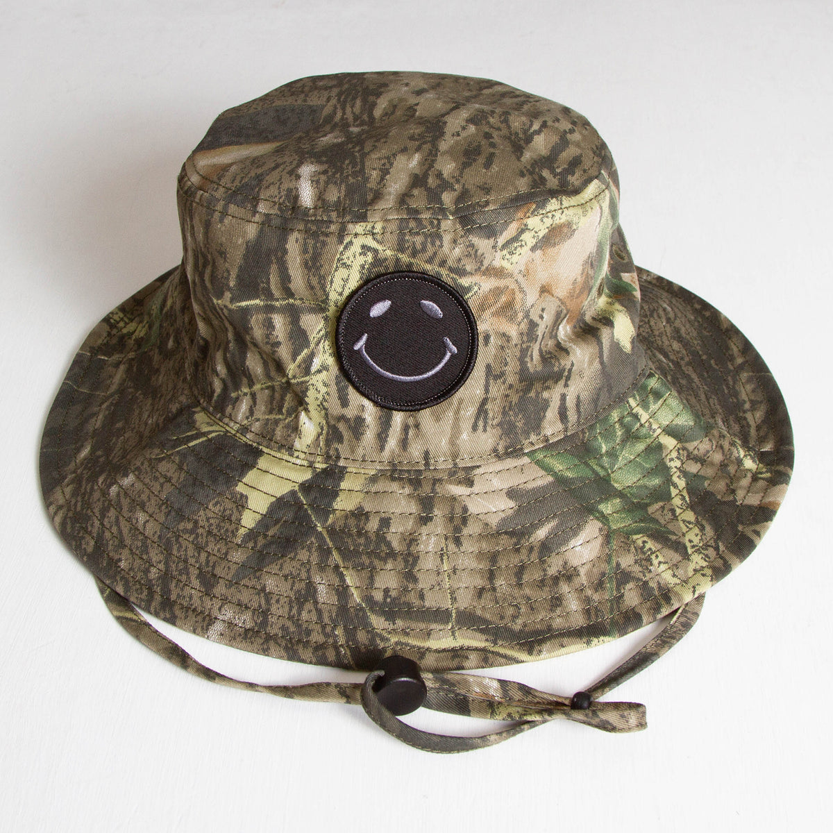 BB Smiley - Draw String Bucket Hat - Realtree